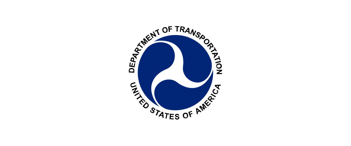 A blue and white logo of the department of transportation.