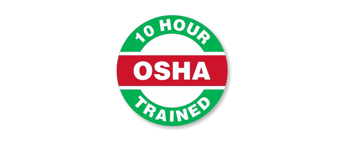 A round sticker that says osha 1 0 hour trained.