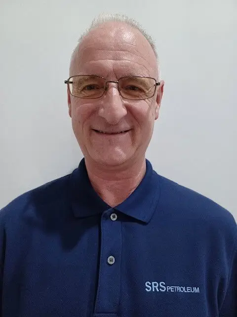 A man with glasses and a blue shirt